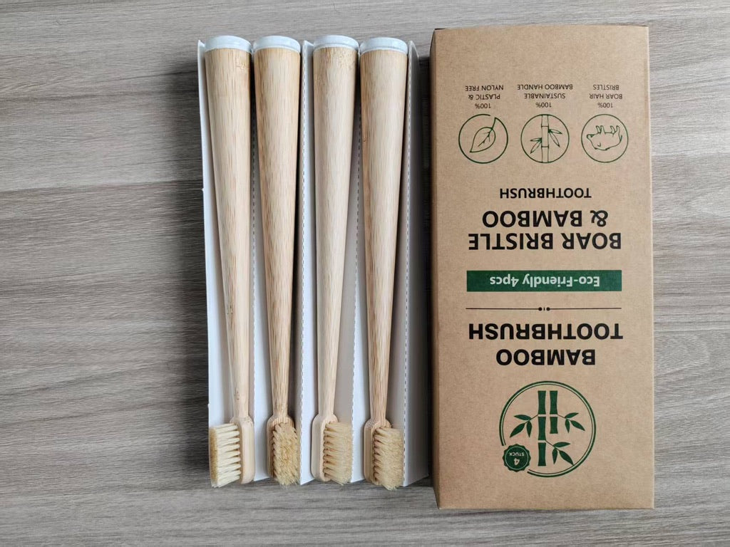 Four round bamboo toothbrushes with light boar bristles, four-pack packaging; photo shows the four-pack